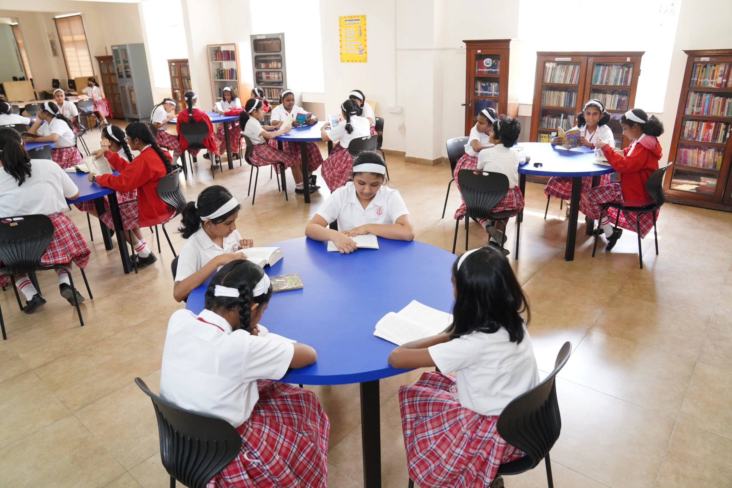 Students walking through a modern school campus