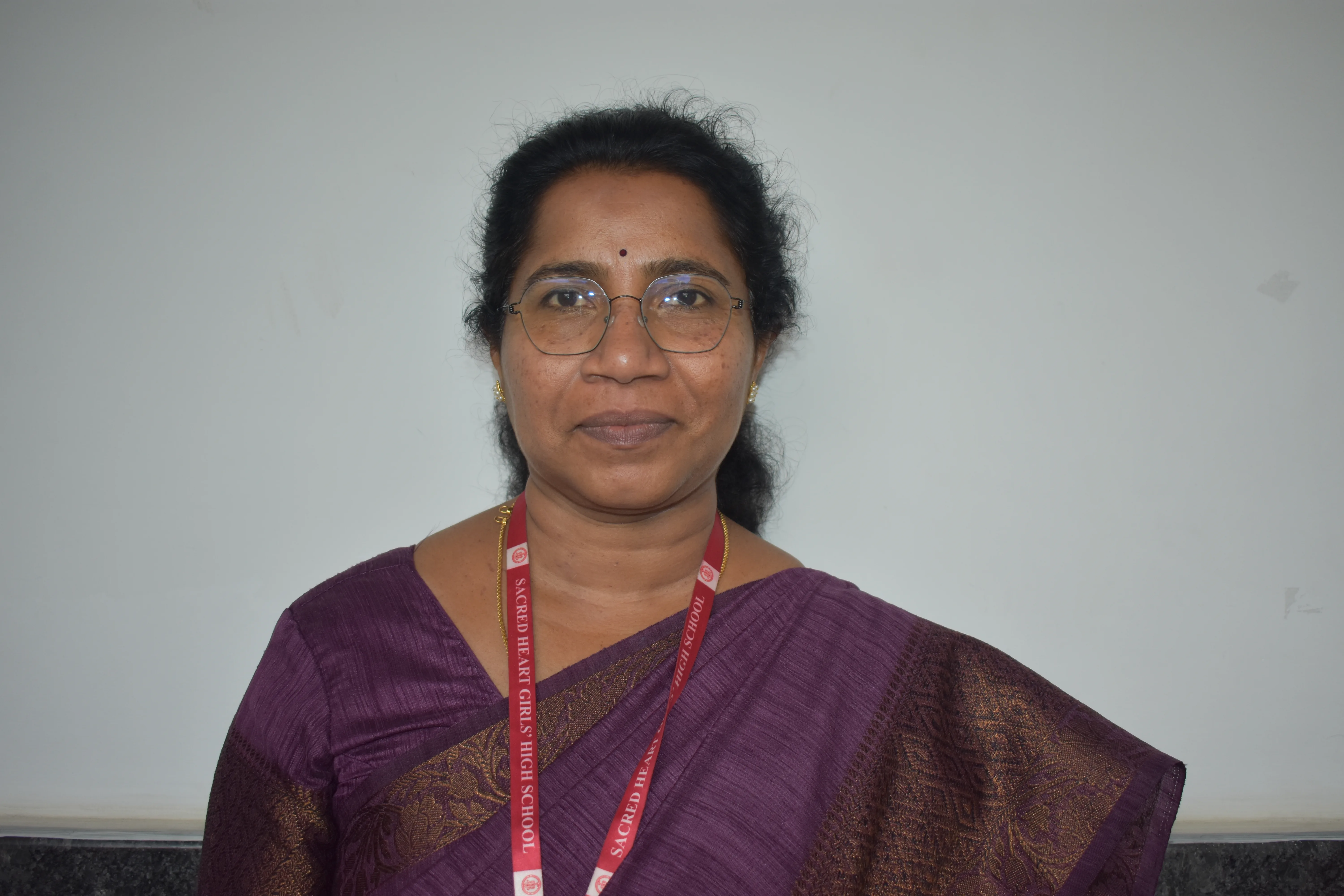 Portrait of Ms. Maya Rajan